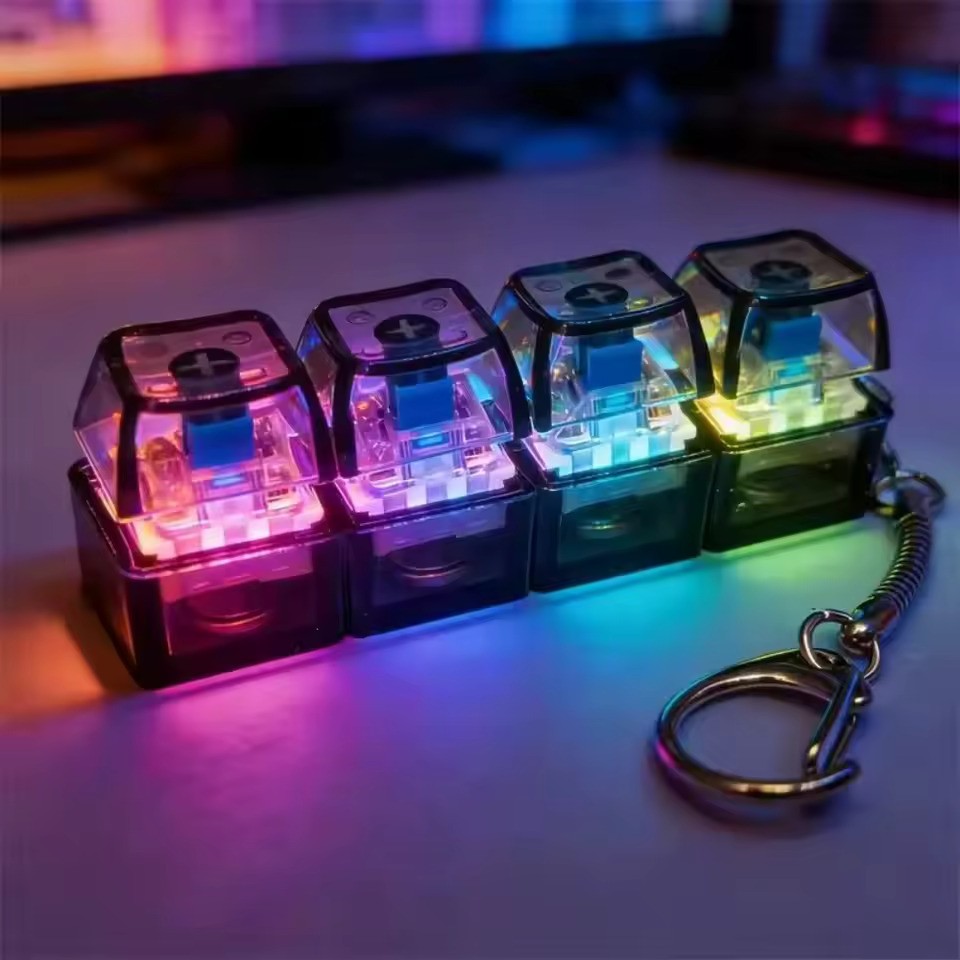 RGB LED Keyboard Keychain glowing with colorful mechanical switches